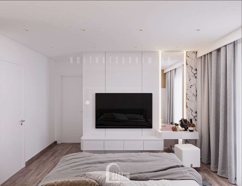 Phía cuối giường thiết kế thêm tivi treo tường hiện đại.