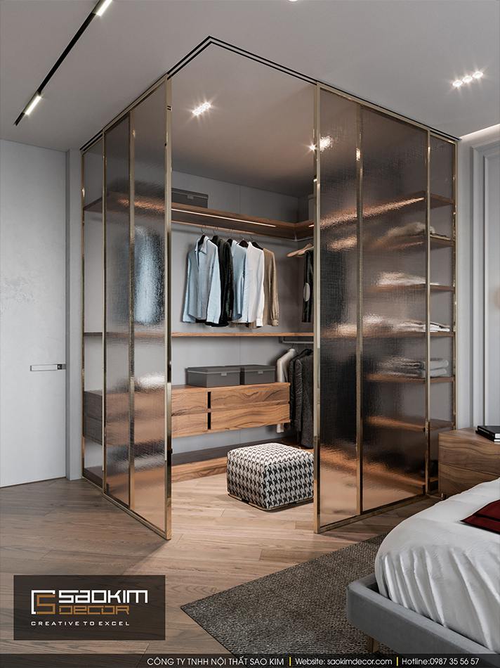 Thiết kế phòng ngủ master với phòng thay đổ nhỏ được ngăn bởi các khung kính