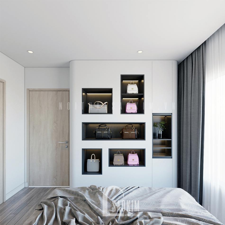 Kệ bày bày túi xách của nữ chủ nhân căn nhà đặt trong phòng ngủ master