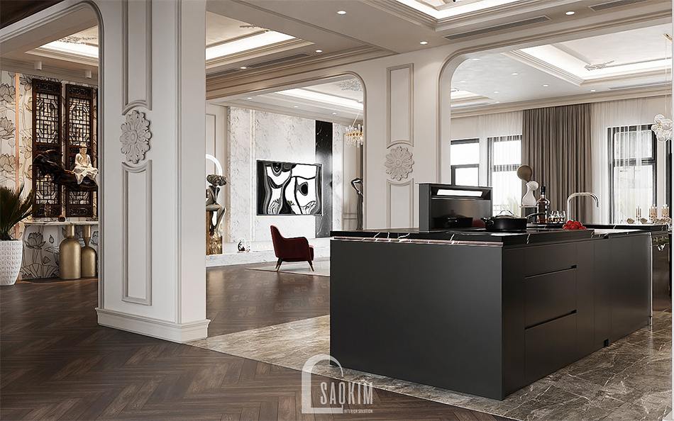 Gam màu đen của khu bếp giúp cân bằng màu sắc cho toàn bộ không gian với gam trắng chủ đạo